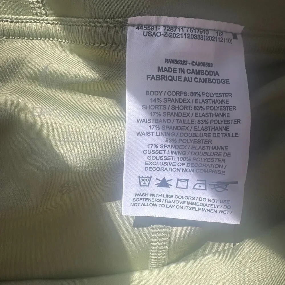 NWT Nike olive Green Tennis Skirt with Shorts Under that have Pockets. Size XL (
